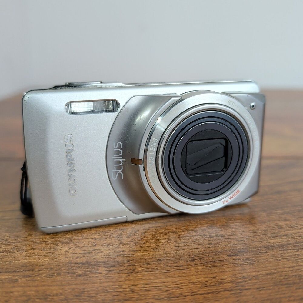 Olympus Stylus 7010 12MP Digital Camera Silver w/ 7x Zoom - Camera Only